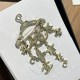 Chanel Brooch In Metal Strass And Resin
