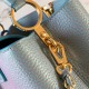 LV Capucines Handbag in Glimmers Contrast Taurillon Leather With Seashell Effect LV And Braided Leather Chain