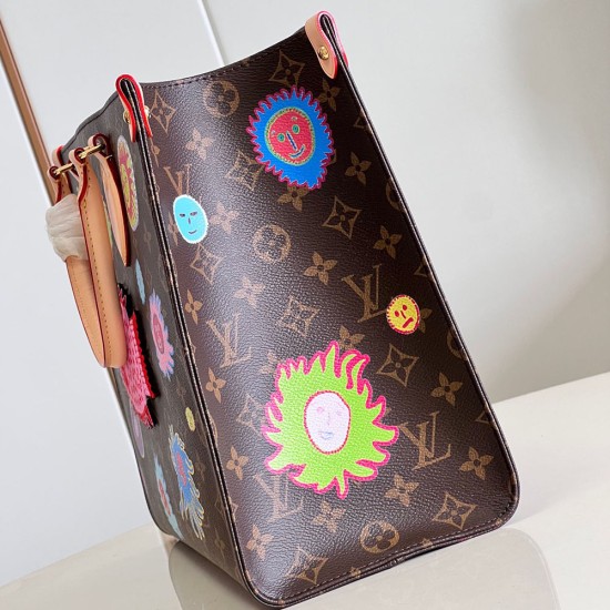 LV x YK OnTheGo MM In Monogram Coated Canvas With Faces print and Embroidery 35cm