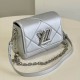LV Quilted Twist PM Handbag In Shimmering Effect Sheepskin Leather With Silver Chain And Lock 19cm