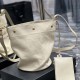 YSL Rive Gauche Bucket Bag in Canvas And Calfskin Leather